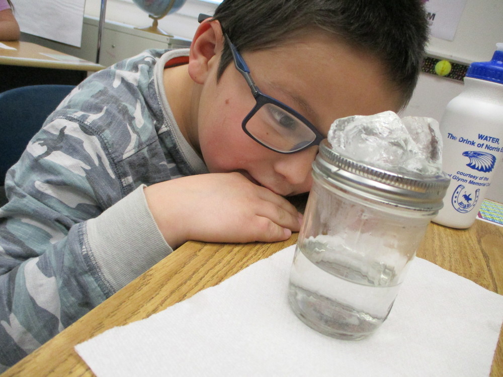 student with jar